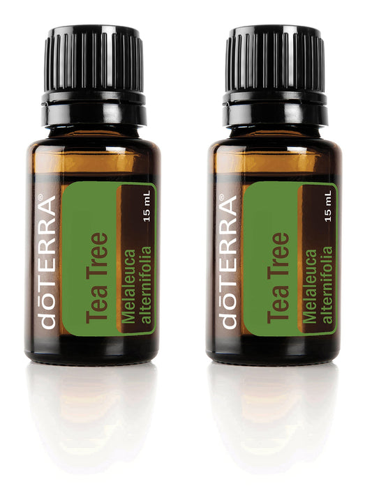 doTERRA Melaleuca oil bottle close-up showcasing 15 ml size and purity for skincare and diffusion.