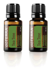 doTERRA Melaleuca oil bottle close-up showcasing 15 ml size and purity for skincare and diffusion.