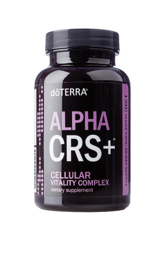 doTERRA Alpha CRS+ bottle pouring shows antioxidant support for cellular vitality.