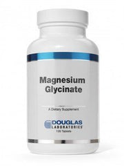 Douglas Laboratories magnesium glycinate label close-up emphasizing GMO-free guarantee.