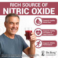 Beet powder whisked in a glass to make a drink