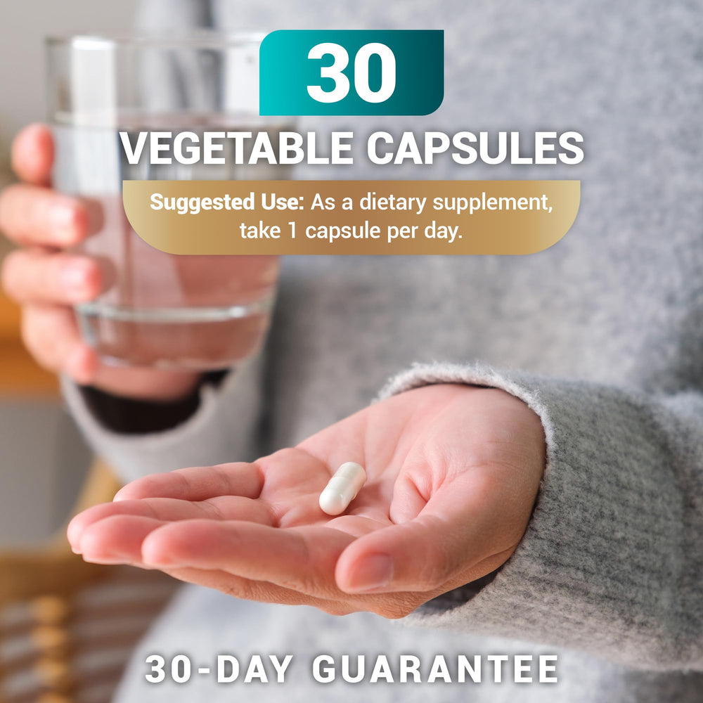 TUDCA capsules beside a glass of water for easy intake.