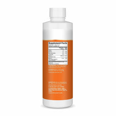 Pouring Dr. Mercola Liposomal Vitamin C to show smooth texture for easy mixing.