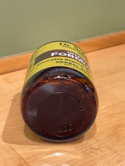 Dr. Schulze's Intestinal Formula #1 bottle on countertop suggests easy daily use.