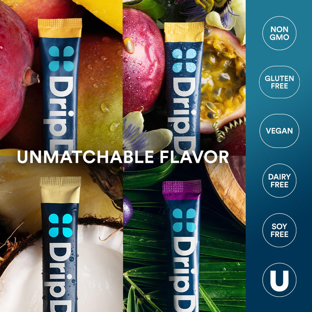 DripDrop mixed packets beside a glass of electrolyte drink