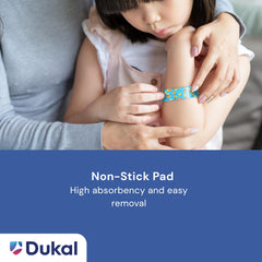 Dukal bandage on skin demonstrates secure protection for minor injuries
