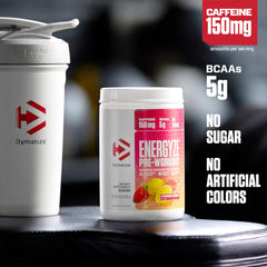 Dymatize Energyze pre-workout drink in glass shows strawberry lemonade flavor after mixing.