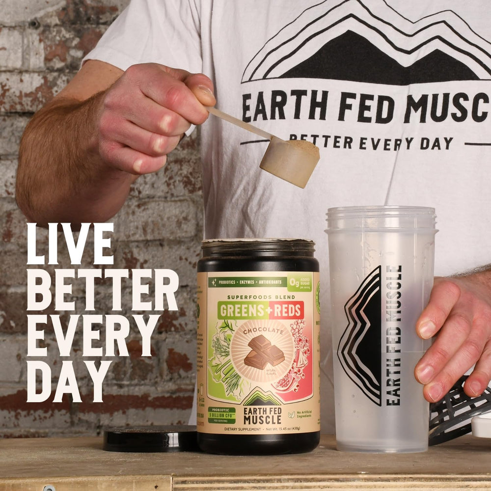 Earth Fed Muscle powder mixing in a glass of water for easy daily shake.