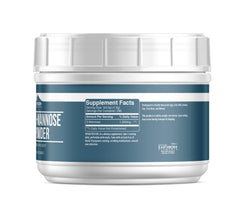 Earthborn Elements D-Mannose Powder scoop ready to mix in drinks.
