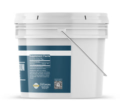 Measuring spoon with Earthborn Elements Magnesium Citrate for accurate dosing.