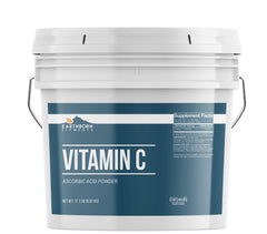 Earthborn Elements Vitamin C powder in a resealable bucket for easy storage.