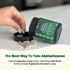 AlphaCleanse bottle on a kitchen island with clear ingredient label.