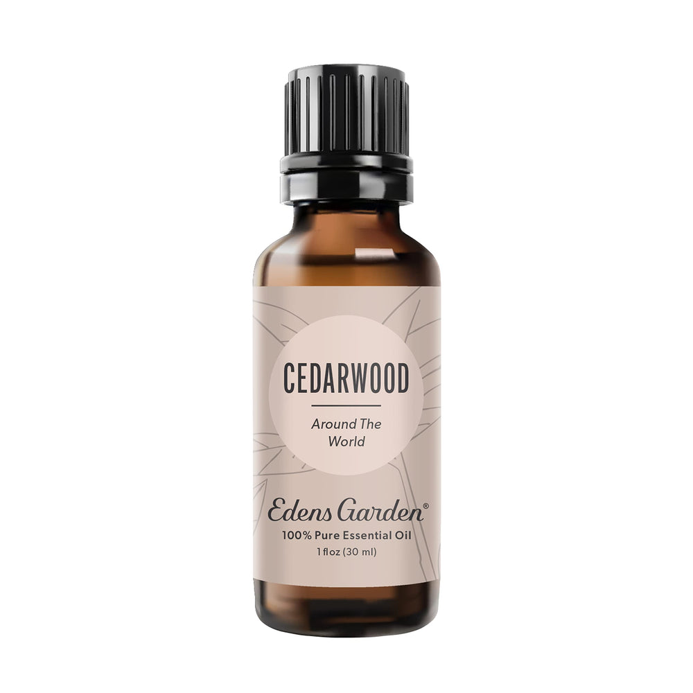 Edens Garden Cedarwood Around The World bottle showing warm woodsy aroma.