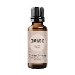 Edens Garden Cedarwood Around The World bottle showing warm woodsy aroma.