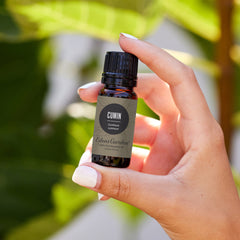Close-up of Edens Garden cumin oil droplet highlighting rich aroma.
