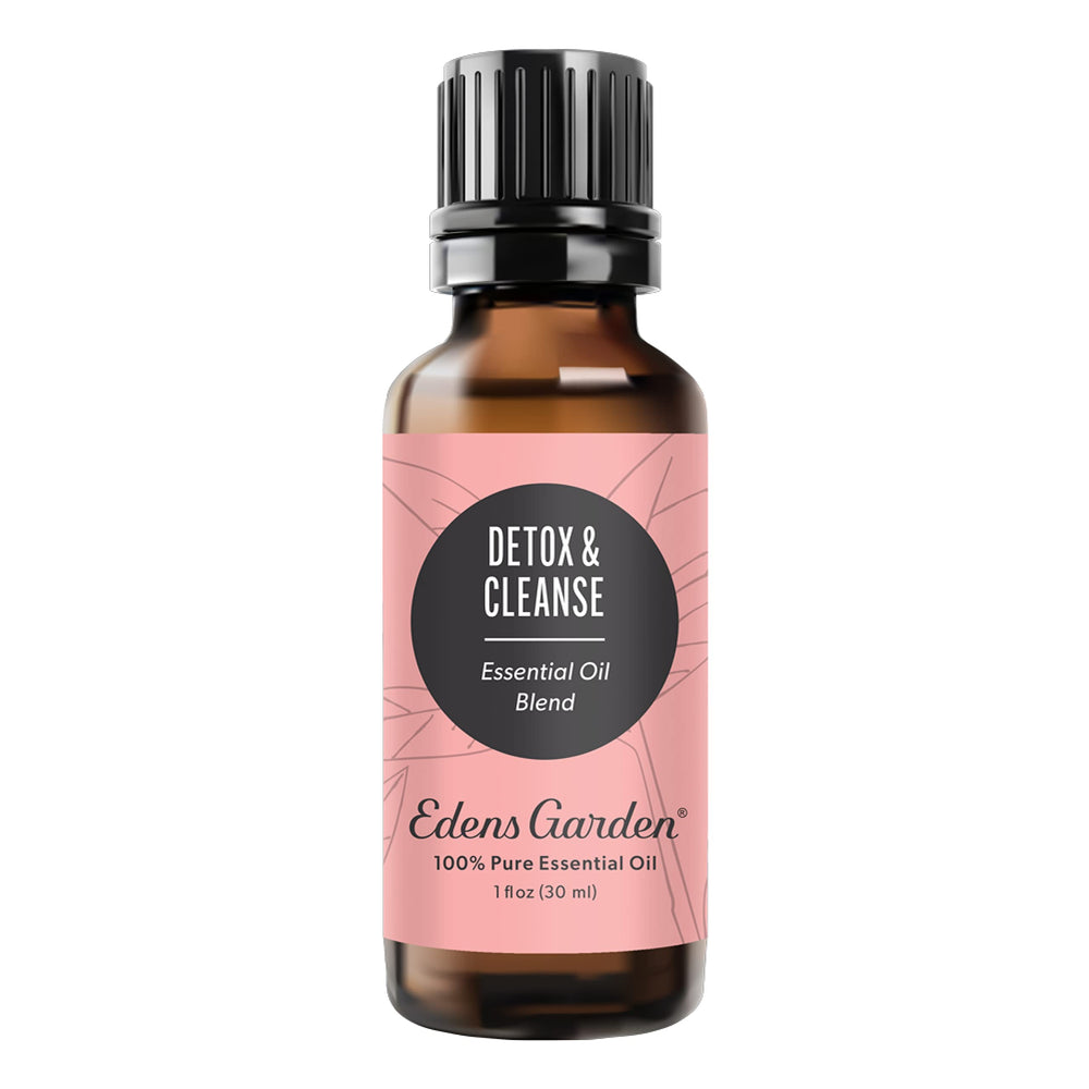 Edens Garden Detox & Cleanse bottle being poured for aromatherapy use