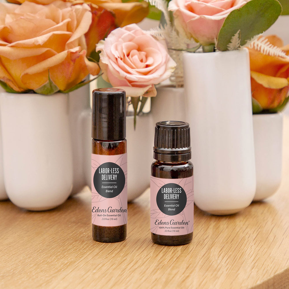 Close-up of Edens Garden Labor-Less Delivery blend bottle, showcasing pure essential oils.