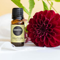 Edens Garden Osmanthus essential oil bottle pour for precise diffuser use.
