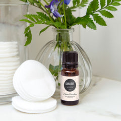 Edens Garden Skin Love label close up showing premium essential oil blend.