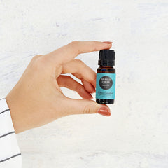 Edens Garden Sore Muscles & Pain Ease label close-up highlighting pure essential oils