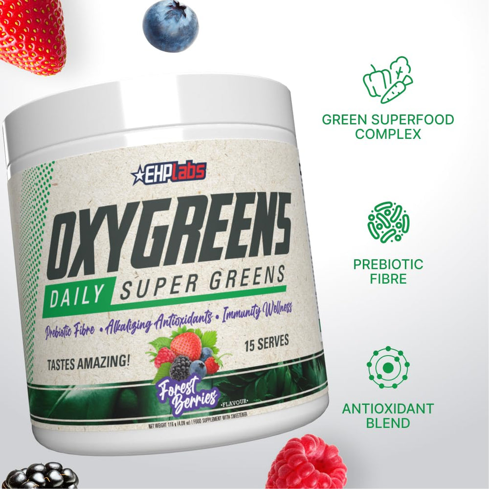 Glass of OxyGreens being stirred into a refreshing antioxidant-rich drink.