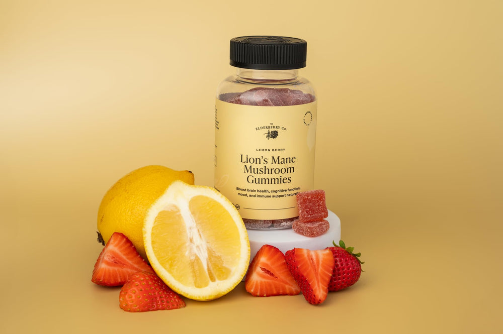 The Elderberry Co. Lion's Mane Gummies bottle on a white surface with lemon berry flavor.