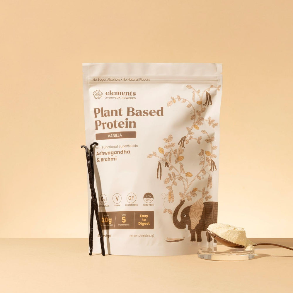 Glass of Elements Vanilla protein shake highlighting flavor and easy mixing