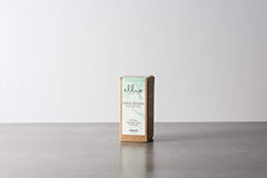 Ellia Wind Down bottle with sage and cardamom creates a soothing, balanced aroma.