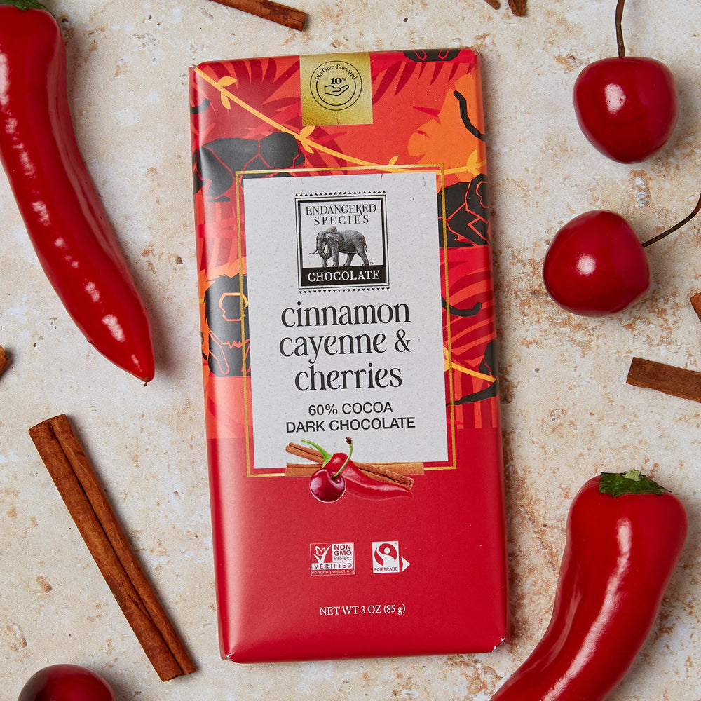 Endangered Species Chocolate bar cinnamon cayenne cherries served on a plate with dessert setup