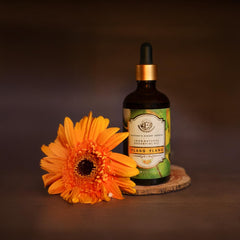 Enhanced Essentials Ylang Ylang essential oil in a diffuser setup for a calming home fragrance.