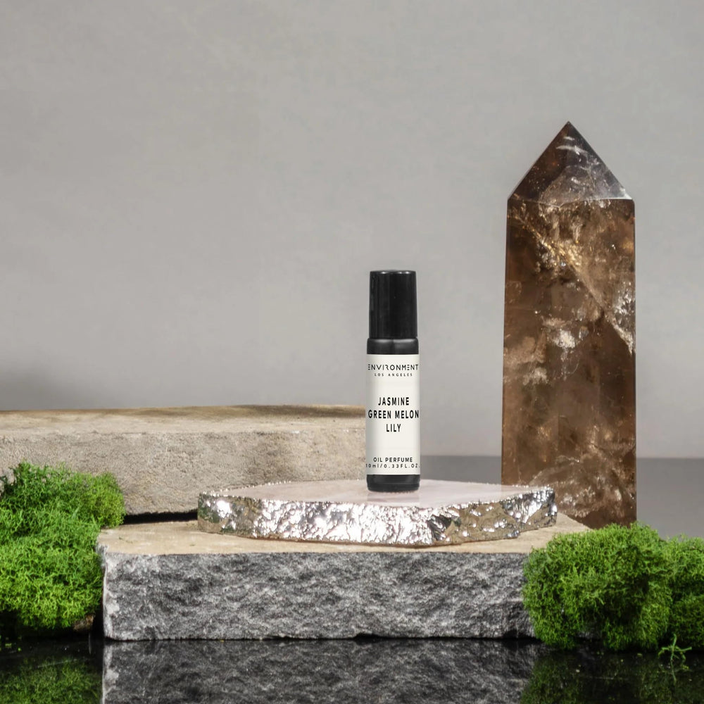 ENVIRONMENT Green melon roll-on bottle for a bright daytime scent.
