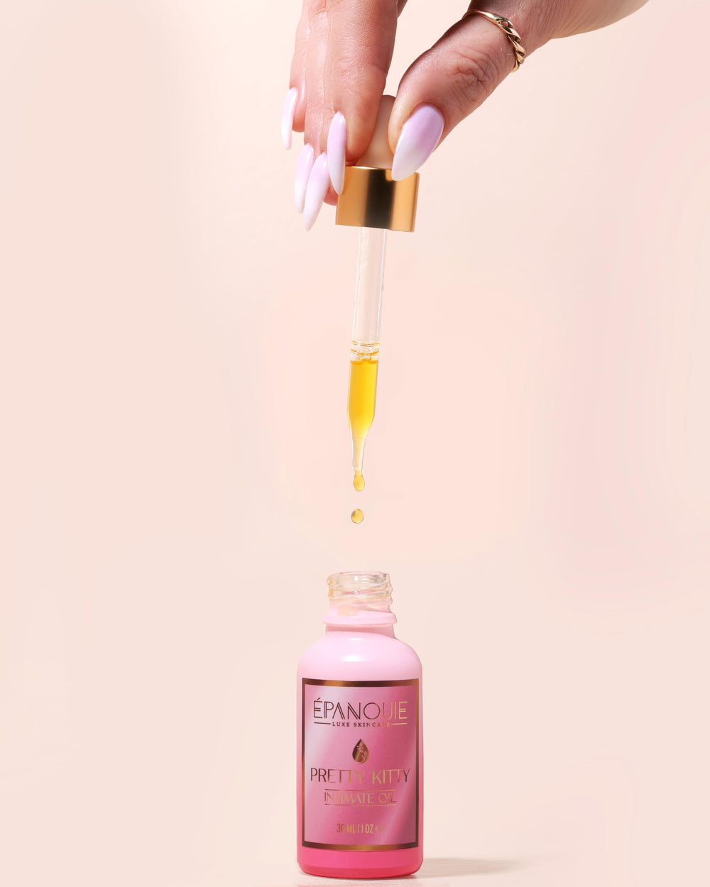 Close-up of Epanouie Skin serum texture showing quick absorption