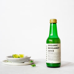 Erbology bergamot juice bottle with water, a simple, clean hydration idea