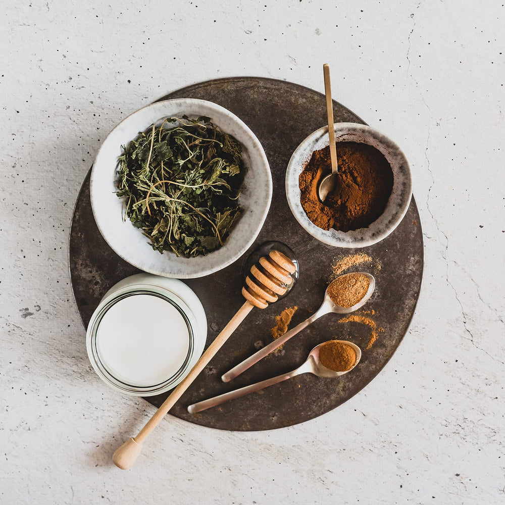 Erbology Chaga powder stirred into coffee for a warm morning ritual