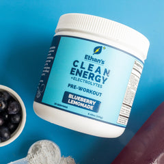 Ethan's Feel Good shaker pouring powder for on-the-go hydration during training