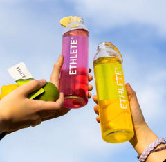Ethlete Electrolytes powder on sports bag, convenient daily hydration.