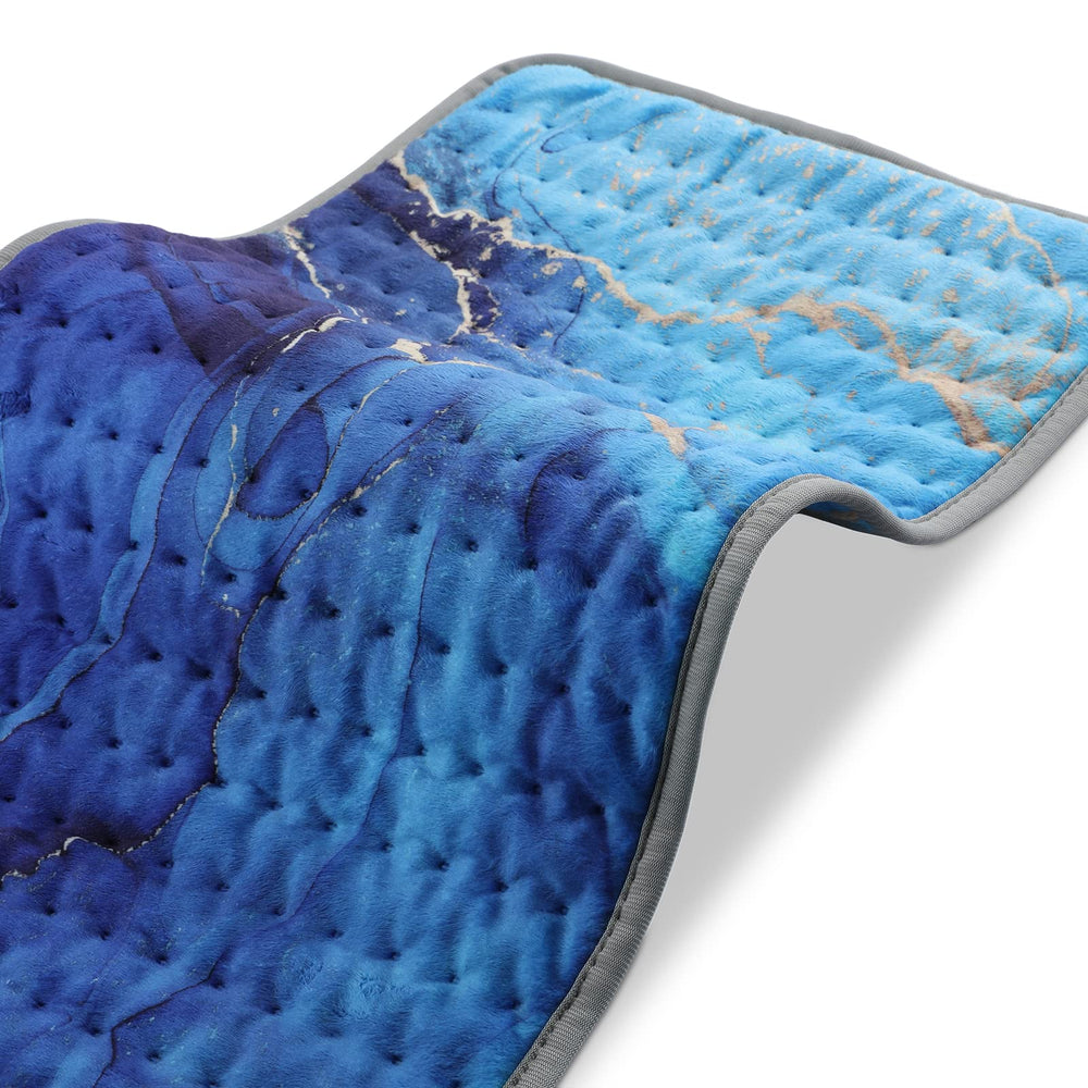 Fabludo Ocean heating pad full-coverage on bed supports large-area warmth.