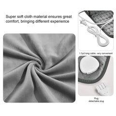 Targeted back and shoulder warmth using Fayelume heating pad