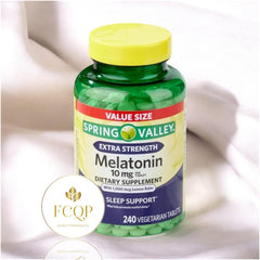 Close-up of melatonin tablets showing the extra-strength formulation for sleep support.