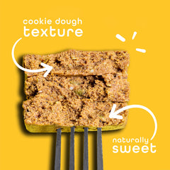 FEEL vegan protein bars Golden Goodness bar in hand shows portable, protein-rich snack on the go