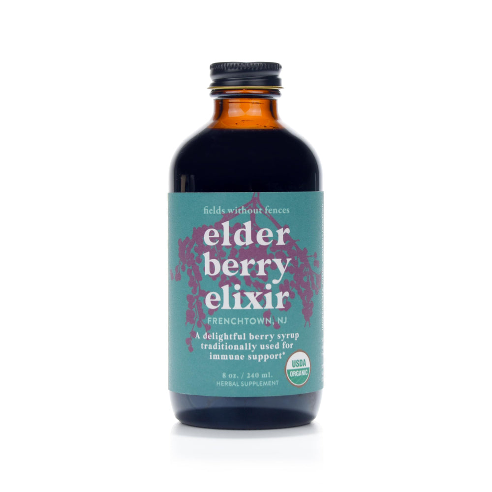 Fields Without Fences Elderberry Elixir bottle with label, highlighting organic elderberries for daily wellness ritual.