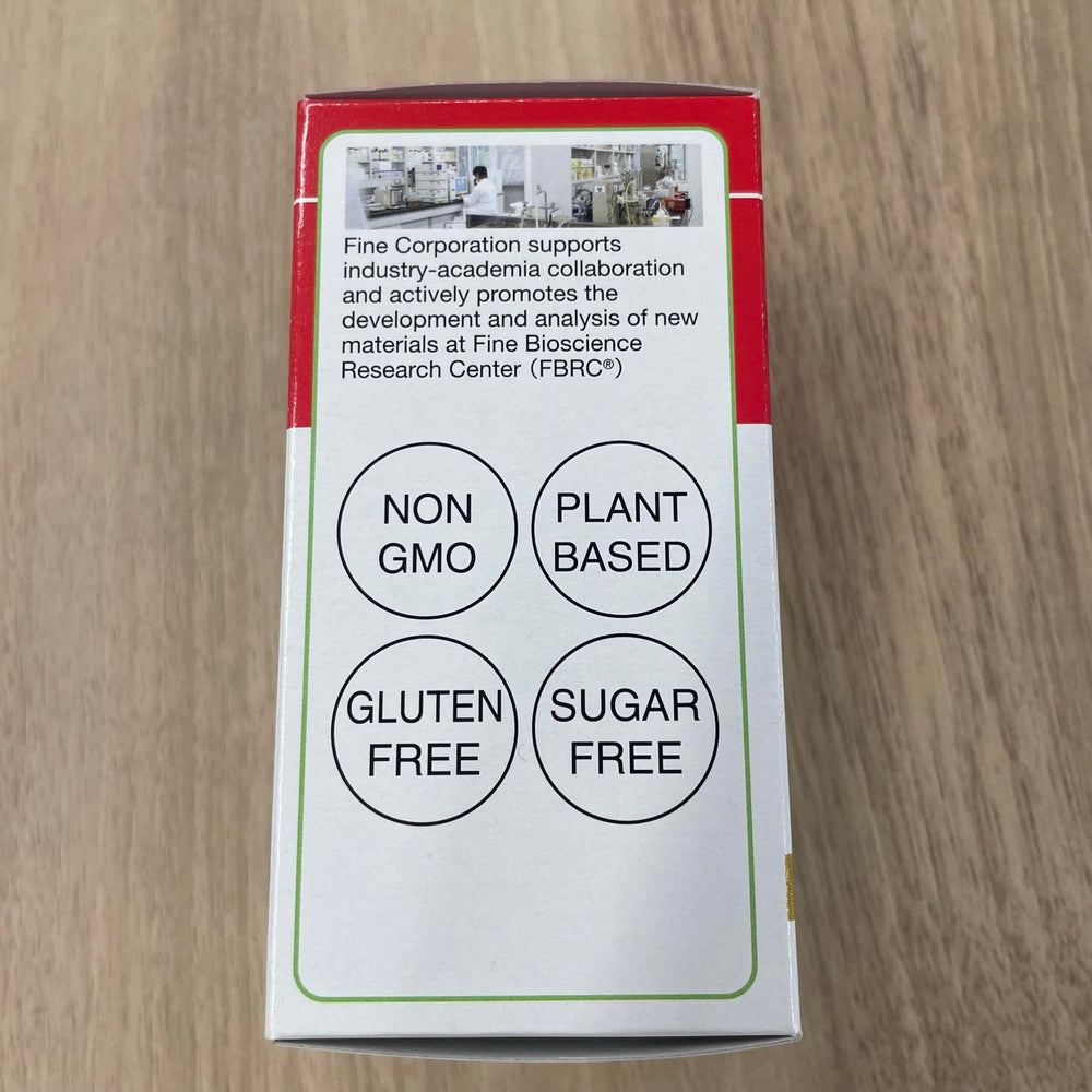 Fine Japan nattokinase tablet close-up ready to swallow