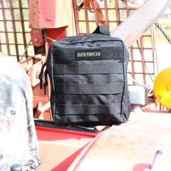 MOLLE pouch secures Elite IFAK for quick vehicle access