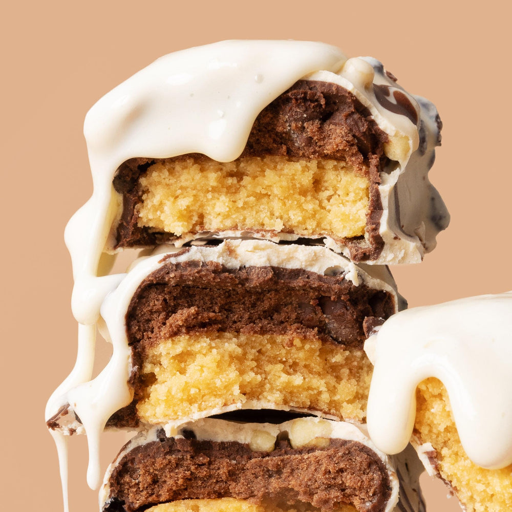 FITCRUNCH Milk & Cookies texture close-up, soft cake core offers a comforting chew.