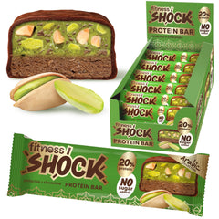 FitnesSHOCK pistachio & dark chocolate bar close-up with real pistachios for a satisfying on-the-go snack.