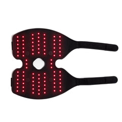 Fringe red light therapy wrap on foot supports post-activity recovery.