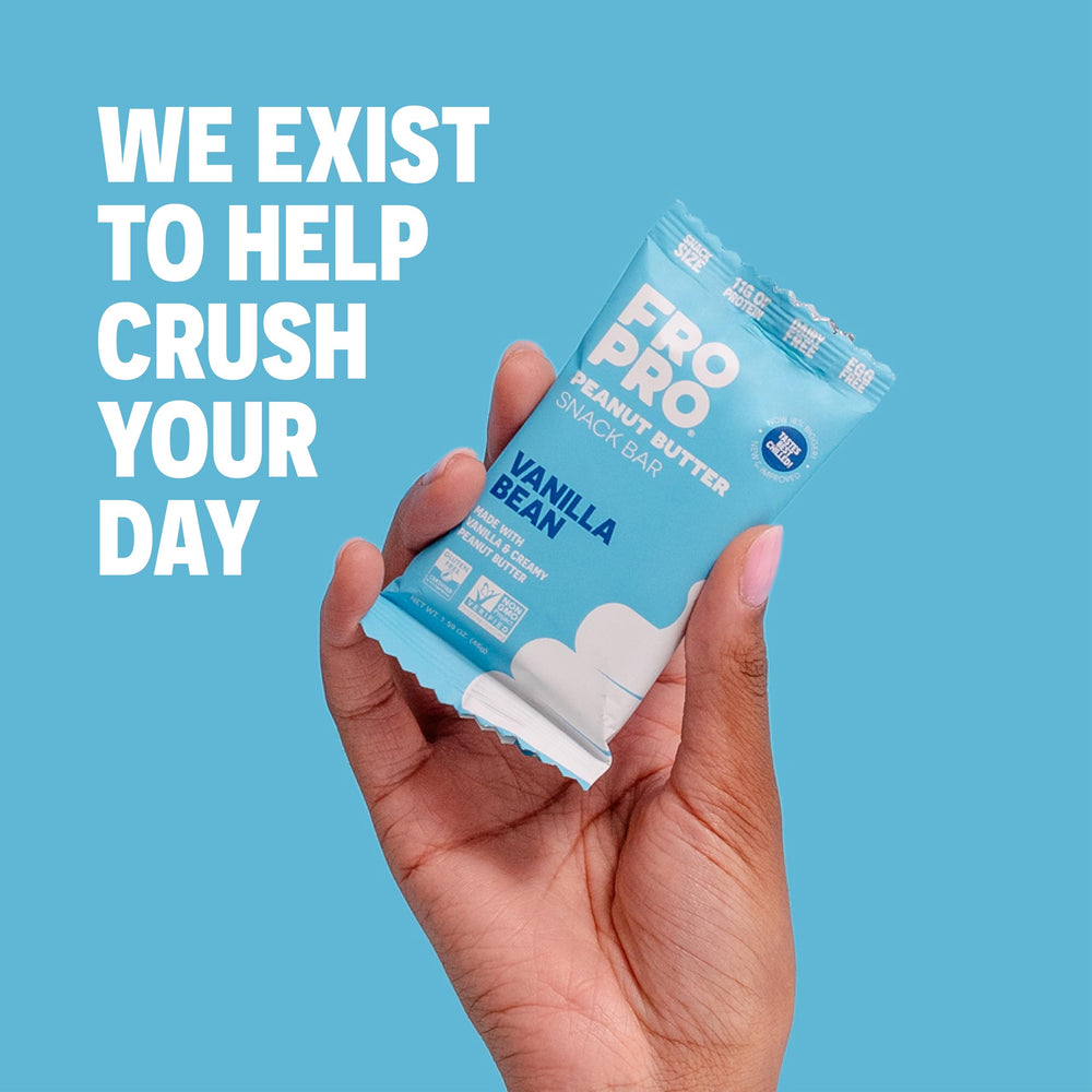 Unwrapping a FRO PRO bar for on-the-go snack.