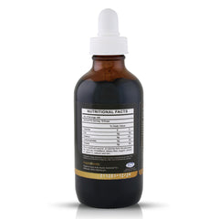 Glass of water with Fulvika Trace Mineral Drops suggesting alkaline hydration