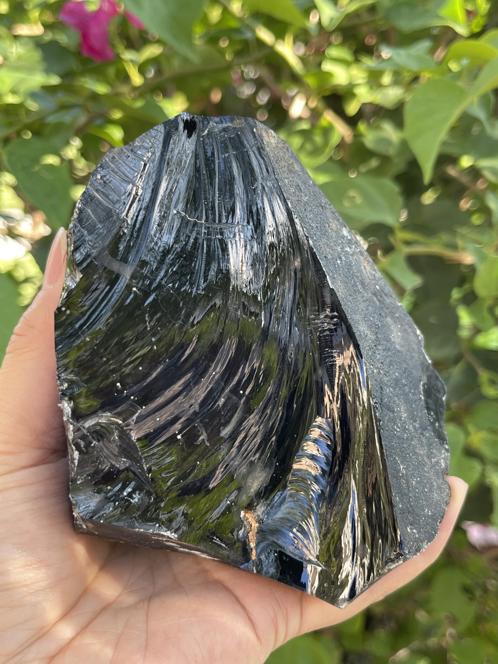GAF TREASURES deep-gloss black obsidian piece invites tactile inspection and decoration.