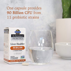 Garden of Life capsules with water illustrate convenient daily use.